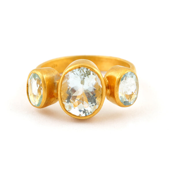 pale blue topaz three stone ring